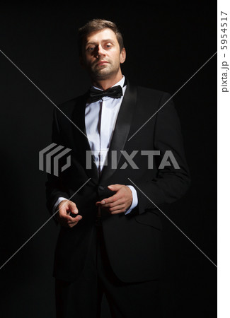 Handsome man in a tuxedo Handsome man in a tuxedo 5954517