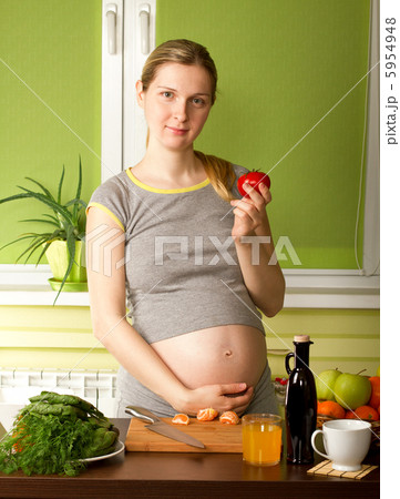 Pregnant Woman On Kitchen Pregnant Woman On Kitchen 5954948