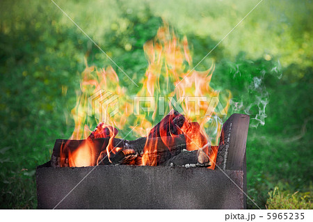 preparing fire for outdoor grill preparing fire for outdoor grill 5965235