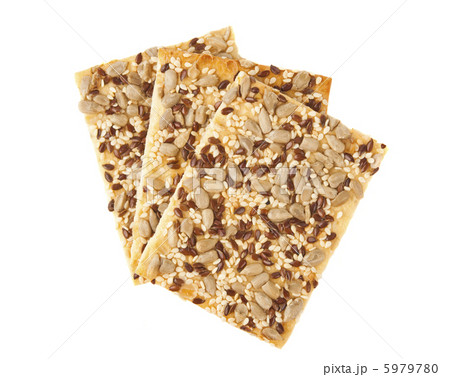 Cookies with sesame seeds isolated on white backgr Cookies with sesame seeds isolated on white backgr 5979780