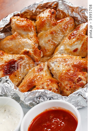 Chicken wings with sauce Chicken wings with sauce 5995708