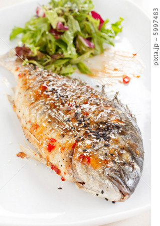 fried fish with fresh herbs and lemon fried fish with fresh herbs and lemon 5997483