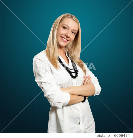 young businesswoman with crossed hands 6006454