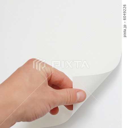 Hand turning page 6049226