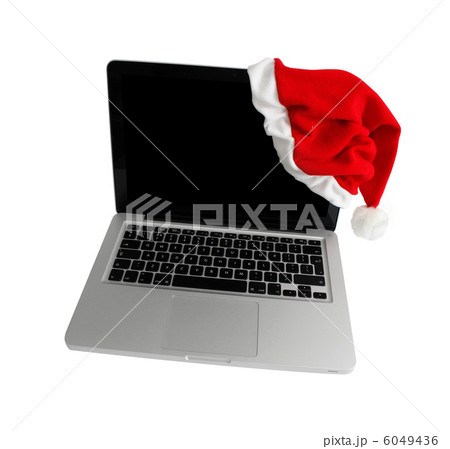 Computer with santa hat Computer with santa hat 6049436