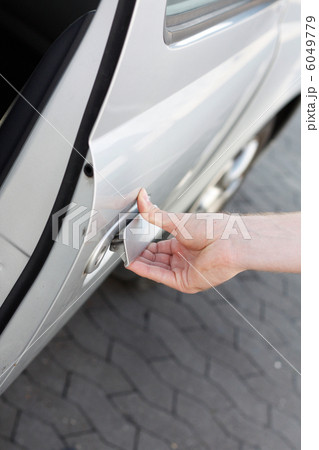 Opening car door 6049779