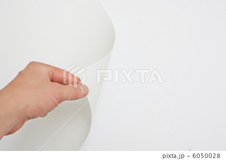 Hand turning page 6050028