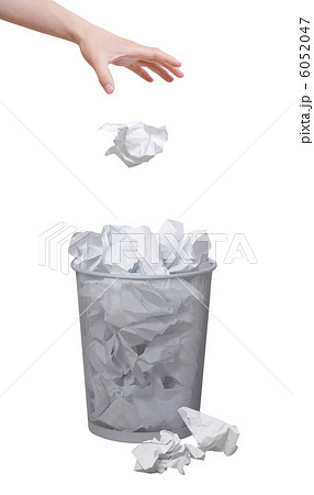 Hand throwing out paper 6052047