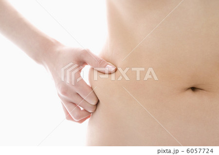 ウエストの贅肉を摘む ウエストの贅肉を摘む 6057724