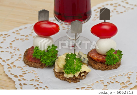 Canape with a mozzarella and tomatoes Canape with a mozzarella and tomatoes 6062213