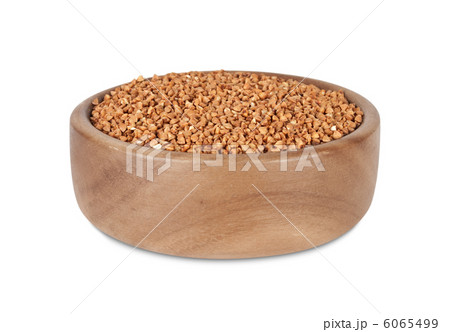 Buckwheat in wooden bowl Buckwheat in wooden bowl 6065499
