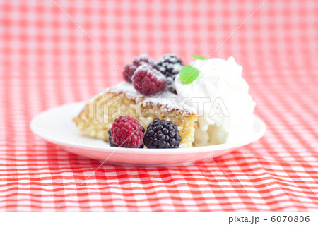 cake with icing,icecream, raspberry, blackberry and mint on a pl cake with icing,icecream, raspberry, blackberry and mint on a pl 6070806