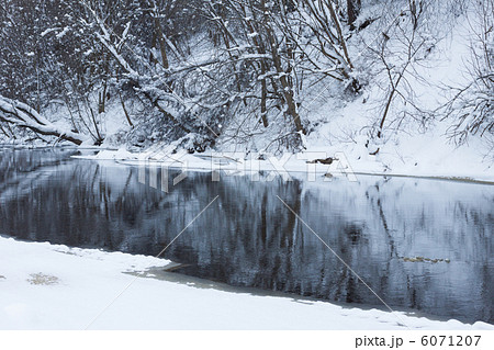 Winter river under white snow 6071207