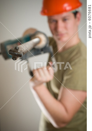 man with drill man with drill 6076681