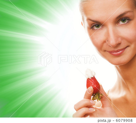Girl with a strawberry on abstract background Girl with a strawberry on abstract background 6079908