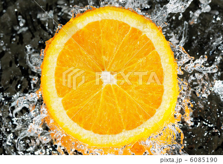 fresh orange in streaming water fresh orange in streaming water 6085190