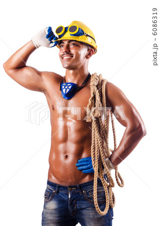 Muscular builder with tools isolated on white 6086319