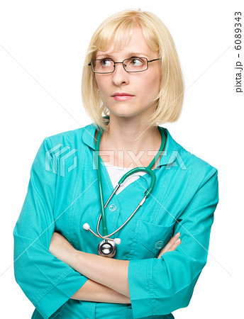 Portrait of a woman wearing doctor uniform Portrait of a woman wearing doctor uniform 6089343