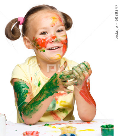 Portrait of a cute girl playing with paints Portrait of a cute girl playing with paints 6089347