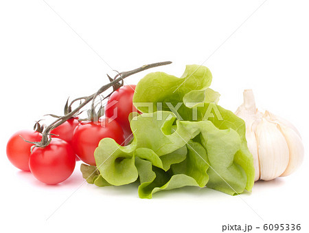 Fresh lettuce salad leaves bunch and cherry tomato 6095336