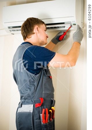 man repair air-conditioner man repair air-conditioner 6104299