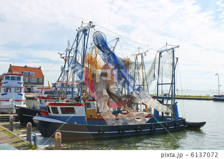 Fishing ships in the port of Volendam. Netherlands 6137072