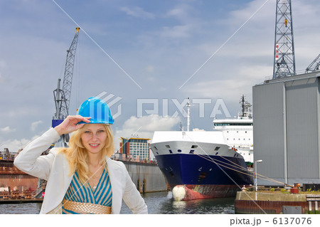 Woman engineer shipbuilder at the shipyard. Woman engineer shipbuilder at the shipyard. 6137076
