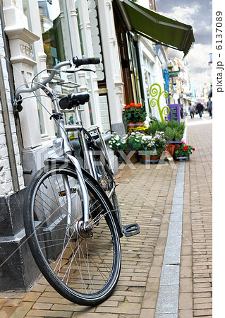 Bicycle is parked near  flower shop in Gorinchem. Netherlands 6137089