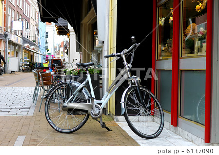 Bike is parked near  shop in Gorinchem. Netherlands 6137090