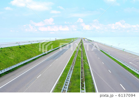 Highway on a great dam in  Netherlands 6137094