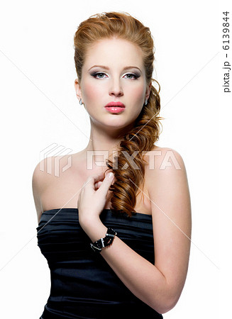 beautiful young red-haired woman with fashion make-up beautiful young red-haired woman with fashion make-up 6139844
