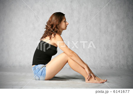 cute brunette sitting 6141677