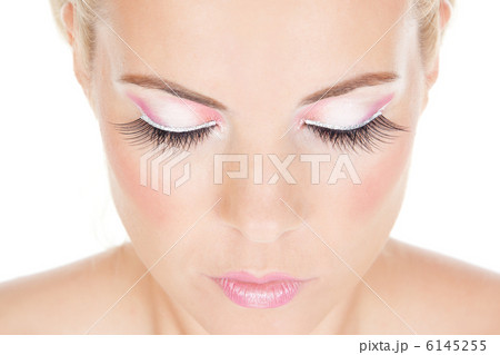 Portrait of beautiful girl with pink glamour make-up 6145255