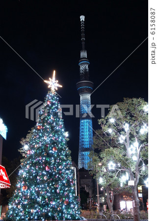 夜景 東京スカイツリーとクリスマスツリー の写真素材