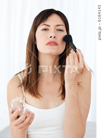 Lovely woman making up 6164145