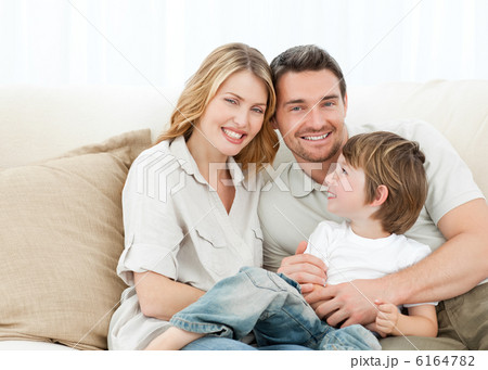 Happy family on their sofa 6164782