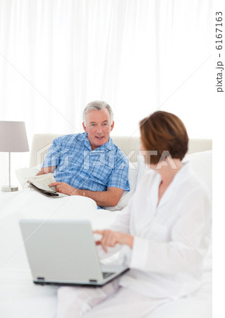 Seniors talking in the bed Seniors talking in the bed 6167163