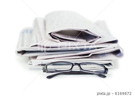 Newspapers and black glasses Newspapers and black glasses 6169872