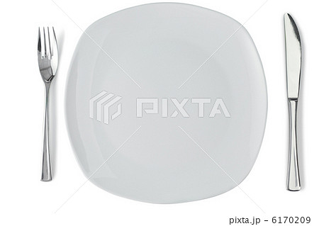 White plate with silver fork and knife White plate with silver fork and knife 6170209