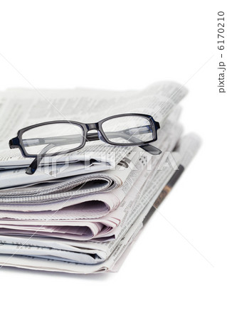 Newspapers and black glasses 6170210