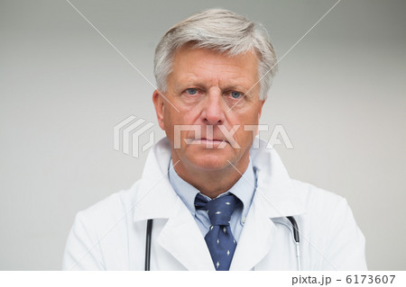 Mature doctor looking serious 6173607