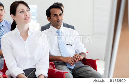 Concentrated business people at a conference Concentrated business people at a conference 6188909