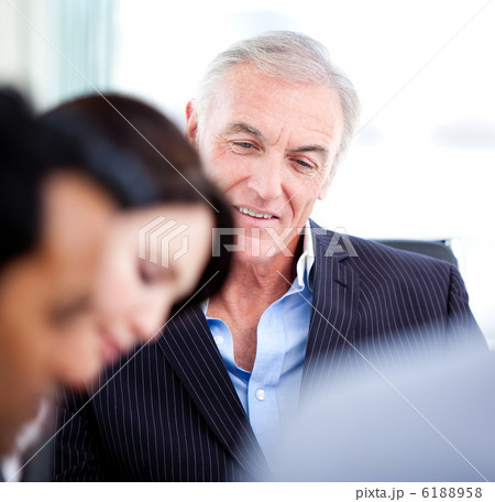Confident senior businessman in a meeting 6188958