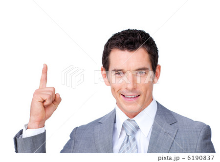 Confident businessman pointing upward 6190837