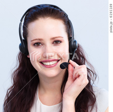 Portrait of smiling beautiful woman with a headset on Portrait of smiling beautiful woman with a headset on 6191189
