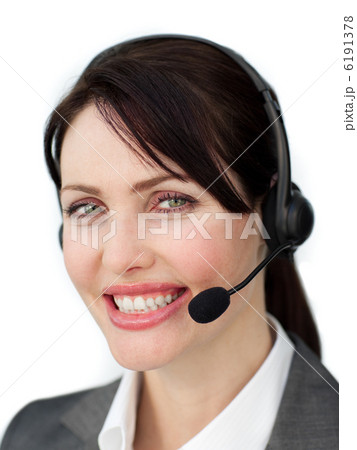 Assertive businesswoman with headset 6191378