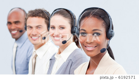 Smiling business team with headset on 6192571