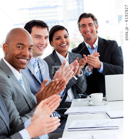 Team of successful multi-ethnic business people applauding Team of successful multi-ethnic business people applauding 6192827