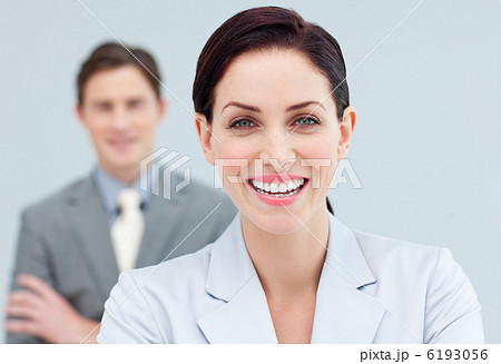 Cheerful business people standing in a row Cheerful business people standing in a row 6193056