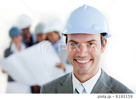 Smiling arhitect with a hardhat Smiling arhitect with a hardhat 6193159